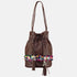 small brown  leather bucket bag with colourful pom pom mirror belt detail and metallic tassles