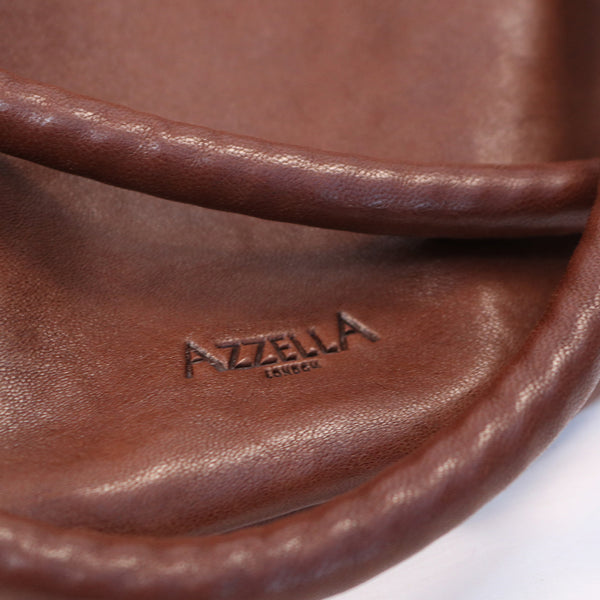 close up shoulder bag straps  hand bag brown soft leather